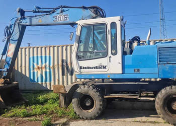 Liebherr 316 siłownik podnoszenia ramienia.