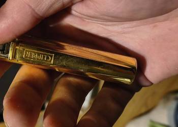 Zloty metalowy clipper