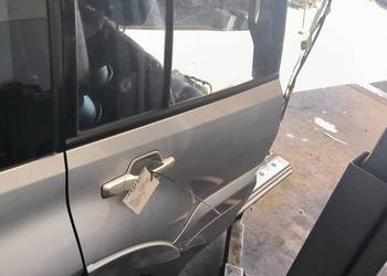 DRZWI PRAWE TYŁ MITSHUBISHI PAJERO IV SREBRNE