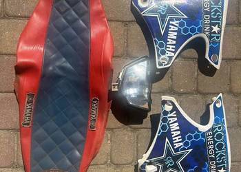 Poszycie siedzenia, klosz lampy, plastiki bok