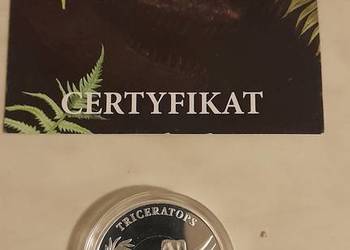 srebrna moneta kolekcjonerską dinozaury