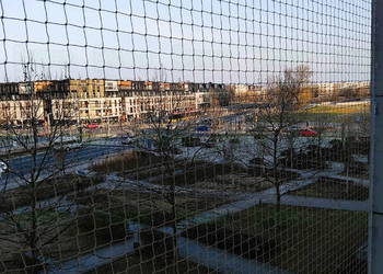 Założenie siatki na balkon dla kotów Warszawa Siatka Bez Wiercenia dla kota