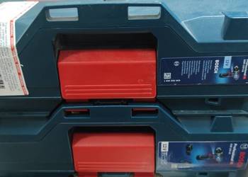 Dwie skrzynki Bosch do wkrętarek ,narzędzi.