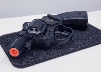 Dziecięcy zabawkowy pistolet na kapiszony