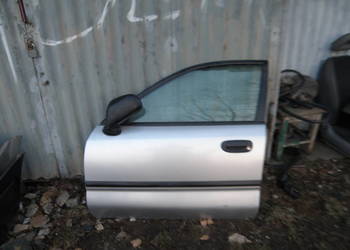 Drzwi lewe przednie lewy przód Mitsubishi Carisma 96-04 srebrne
