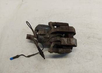 BMW G21 G20 Kombi 330e zacisk jarzmo prawy tył tylny oryg