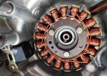 Stator iskrownik kymco grand dink 250