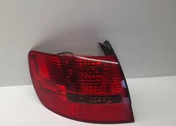 LAMPA LEWY TYŁ W BŁOTNIK AUDI A6 C6 4F9945095