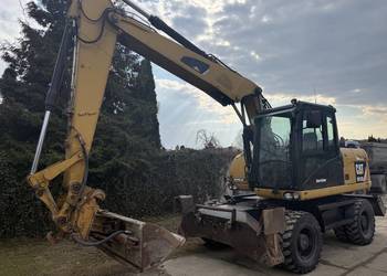 Sprzedam koparkę kołową Cat 313 D