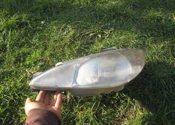 Reflektor przedni lewy lampa lewa Peugeot 206 przedlift 98-03