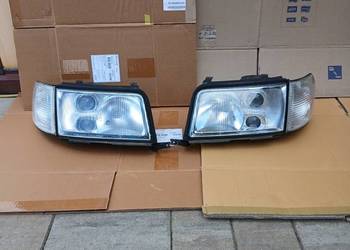 Lampy reflektory przód soczewkowe Audi 100 S4 C4 Hella