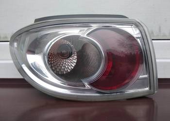 Mazda 2 DY LIFT lampa tył tylna lewa narożna w błotnik oryginał Hella