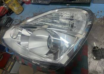 RENAULT MODUS LIFT 08-12 LAMPA LEWA PRZEDNIA 8200658385 Reflektor