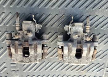 Zacisk hamulcowy jarzmo tył prawy lewy nissan primera P12