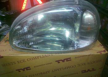OPEL CORSA B  REFLEKTOR H4 MAN LEWY NOWY TYC