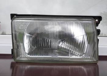 VW Polo II 86c2f lampa przednia prawa reflektor przód pasażera Hella