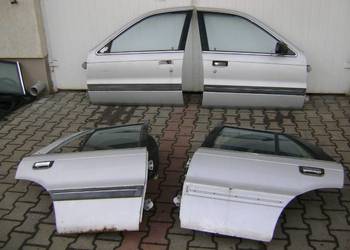 LANCER IV 98r  DRZWI  KLAPA SZYBA