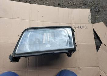 AUDI 100 C4 LAMPA PRZÓD PRZEDNIA LEWA KLOSZ LAMPY HELLA