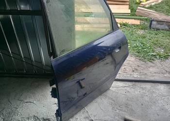 Drzwi lewy tył z ramką szyby a4 B5 Avant LZ5L