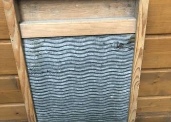 Tara w drewnianej ramie