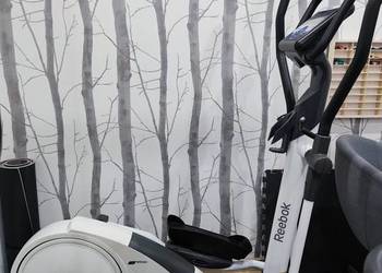 Orbitrek magnetyczny Reebok jak nowy, kompaktowy wymiar.