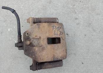 zacisk hamulcowy jarzmo nissan Primera P12 lewy przód