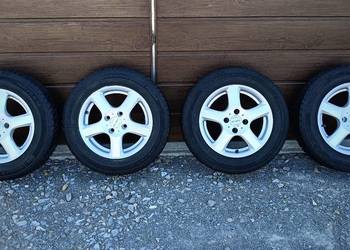 Alufelgi z oponami wielosezonowymi Continental 165/70 R14 4x100 ET35