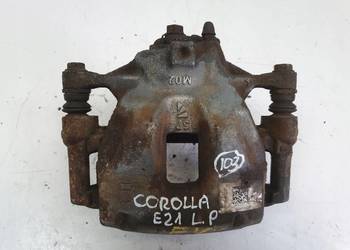 Toyota Corolla XII E21 PRAWY PRZEDNI ZACISK HAMULCOWY przód PASAŻERA