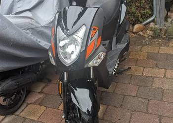 Skuter Kymco na kartę rowerową lub dowód.