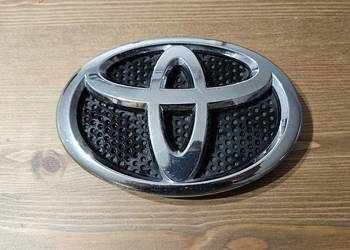 TOYOTA AURIS II ZNACZEK EMBLEMAT GRILLA PRZÓD 75312-02120
