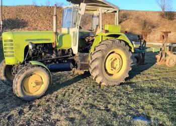 Ursus C4011 z pługiem 3 skibowy obrotowy firmy Gassner