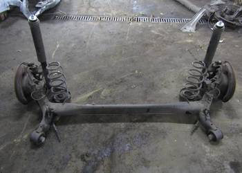 BELKA OŚ ZAWIESZENIA TYŁ TYLNA 1.3 VVT-i TOYOTA YARIS III LIFT