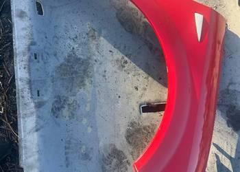 Blotnik przod prawy renault scenic 2 czerwony