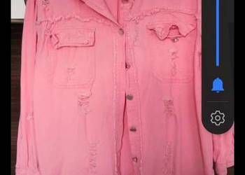 Bluza z przetarciami.