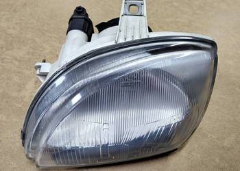 Reflektor lewy Seicento oryginał Carello 46512758