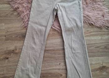 Piękne szerokie spodnie dzwony beżowe w prążki paski 38 bawełna