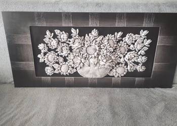 Płaskorzeźba słoneczniki.