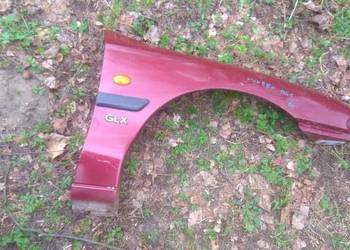 Błotnik przedni prawy FORD MONDEO MK1.  Wiśniowy