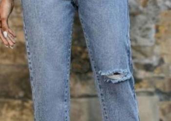Jeansy damskie z rozdarciami  ,,M''
