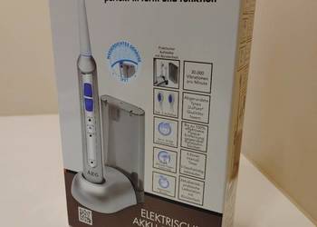 Nowa, nigdy nieotwierana elektryczna szczoteczka do zębów