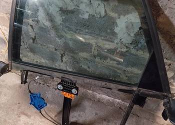 Audi a4 b6 szyba z ramką i mechanizmem lewy tył
