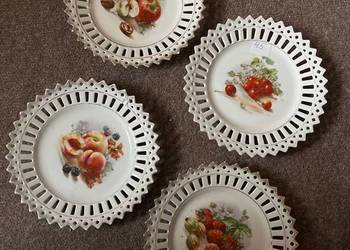 Talerzyk z ażurem, z grupami owoców. Biała porcelana, złocona. Talerzyk z ażurem, z grupami owoców. Biała porcelana, złocona.