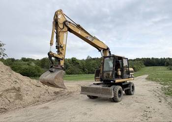 Cat M312