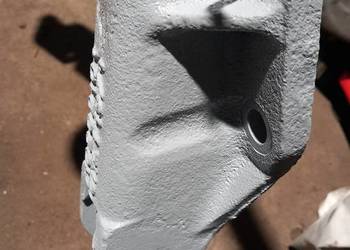 Wspornik mocowania dźwigni dolnych c328  oryginalne