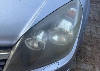 Lampa przód lewa Opel Astra H