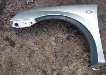 Błotnik przedni lewy OPEL CORSA c srebrny bez malowania