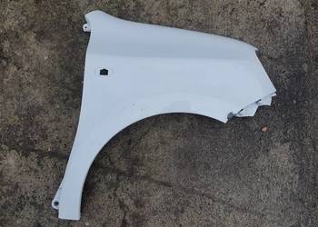 RENAULT TWINGO 3 III BŁOTNIK PRAWY PRZÓD PRZEDNI 631006296R