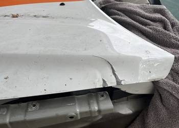 Maska Dacia duster 2 . Biała do poprawy dwa punkty