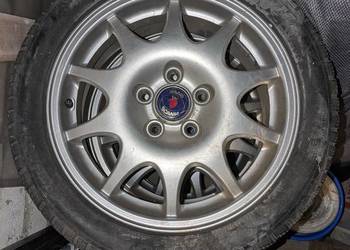 (4 szt.) Alufelgi Saab z oponami Dunlop, 5x110, roz. 16x6.5