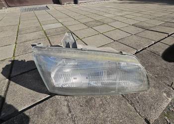 HYUNDAI H1 H-1 PRAWA LAMPA REFLEKTOR ORYGINAŁ SZKLANA pod halogen